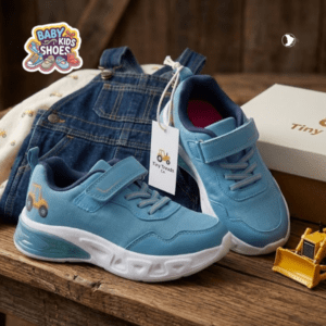 Kids' Blue Sports Sneakers tractor graphic and a lightweight, athletic build, they are perfect for school, the playground, or weekend outings.